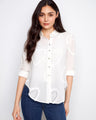 Elegant shirt with a classic collar, perfect for a polished look. Features intricate eyelet details throughout. By Charlie B.