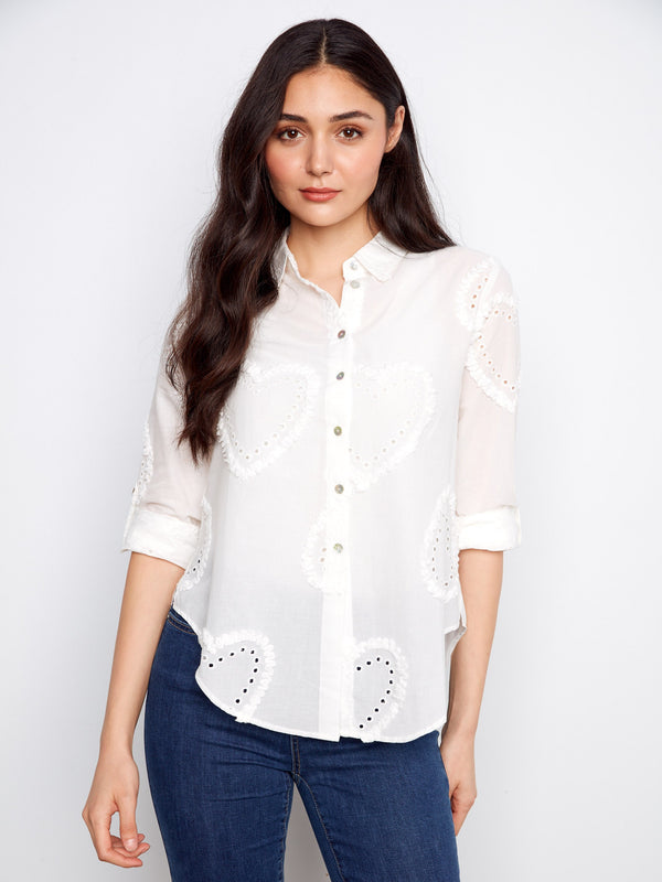 Elegant shirt with a classic collar, perfect for a polished look. Features intricate eyelet details throughout. By Charlie B.