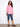 Elegant pink textured blouse featuring button-down front and unique eyelet designs for added flair by Charlie B.