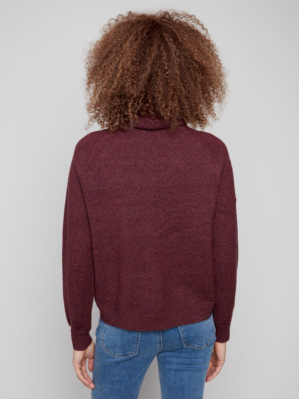 This Heather Cabernet knit showcases a seamless back design for a sleek finish by Charlie B.