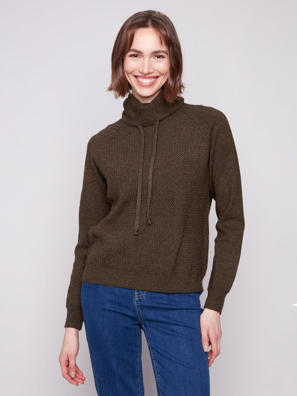 Spruce knit sweater with a cozy cowl neck and adjustable drawstring for versatile styling by Charlie B.