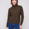 Spruce knit sweater with a cozy cowl neck and adjustable drawstring for versatile styling by Charlie B.