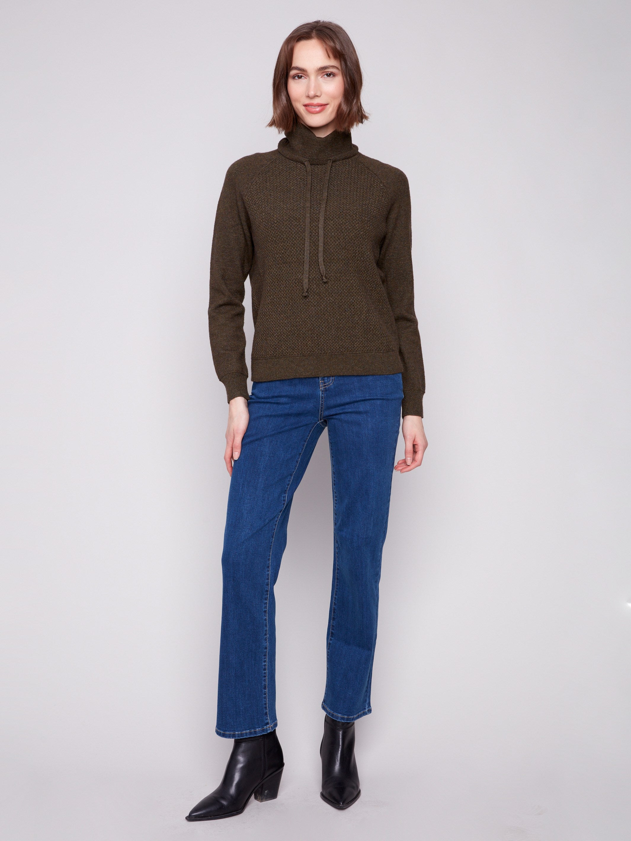 Elegant textured front on this heather spruce sweater adds a touch of sophistication by Charlie B.