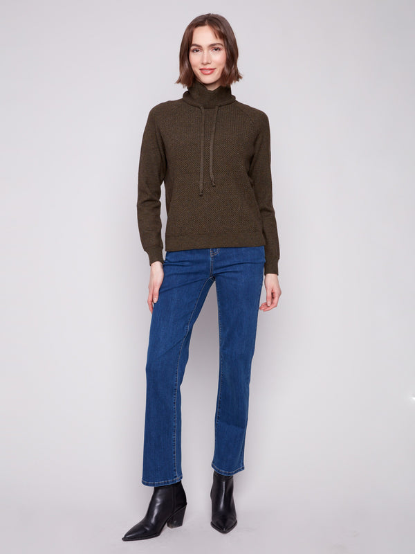 Elegant textured front on this heather spruce sweater adds a touch of sophistication by Charlie B.