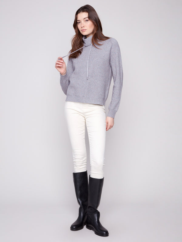 Heather grey sweater showcasing a beautifully textured front, perfect for cozy days by Charlie B.