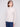 Long-sleeve oat sweater in textured fabric, paired effortlessly with blue jeans for a sleek appearance by Charlie B.