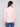 Long-sleeve ballet pink sweater styled with blue jeans, emphasizing the textured fabric by Charlie B.