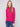 Hibiscus sweater with textured fabric and long sleeves, paired elegantly with blue jeans by Charlie B.