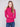Elegant hibiscus sweater featuring a slim fit design, styled with classic blue jeans by Charlie B.