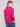 Chic hibiscus long-sleeve sweater showcasing its mock neck style, matched with blue jeans by Charlie B.