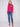 Stylish hibiscus sweater crafted from textured fabric, perfectly paired with denim jeans by Charlie B.