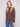 Mocha sweater featuring a slim fit, paired with blue jeans, offering a chic and comfortable style by Charlie B.