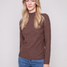 Mocha sweater featuring a slim fit, paired with blue jeans, offering a chic and comfortable style by Charlie B.