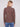 Long-sleeve mocha sweater with textured fabric, complemented by casual blue jeans for an effortless look by Charlie B.