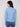 Slim fit Oxford blue sweater styled with denim, highlighting its chic and modern appeal by Charlie B.
