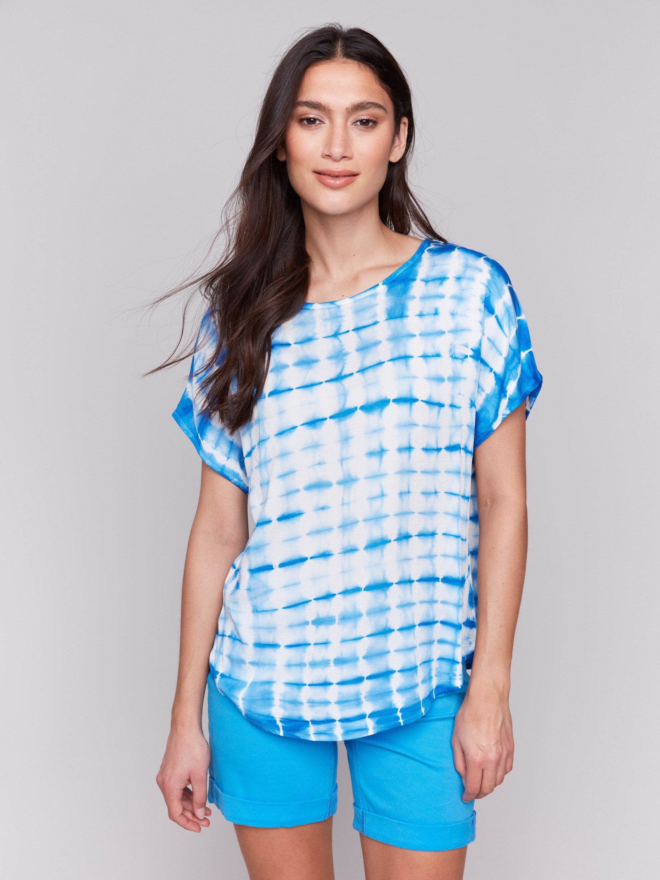Azure top with a crew neck and relaxed fit by Charlie B.