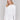 White bolero featuring a shawl neckline by Charlie B.