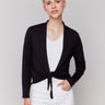 Black bolero featuring a shawl neckline by Charlie B.