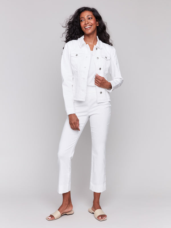 White twill jean jacket with frayed edges and front pockets by Charlie B.