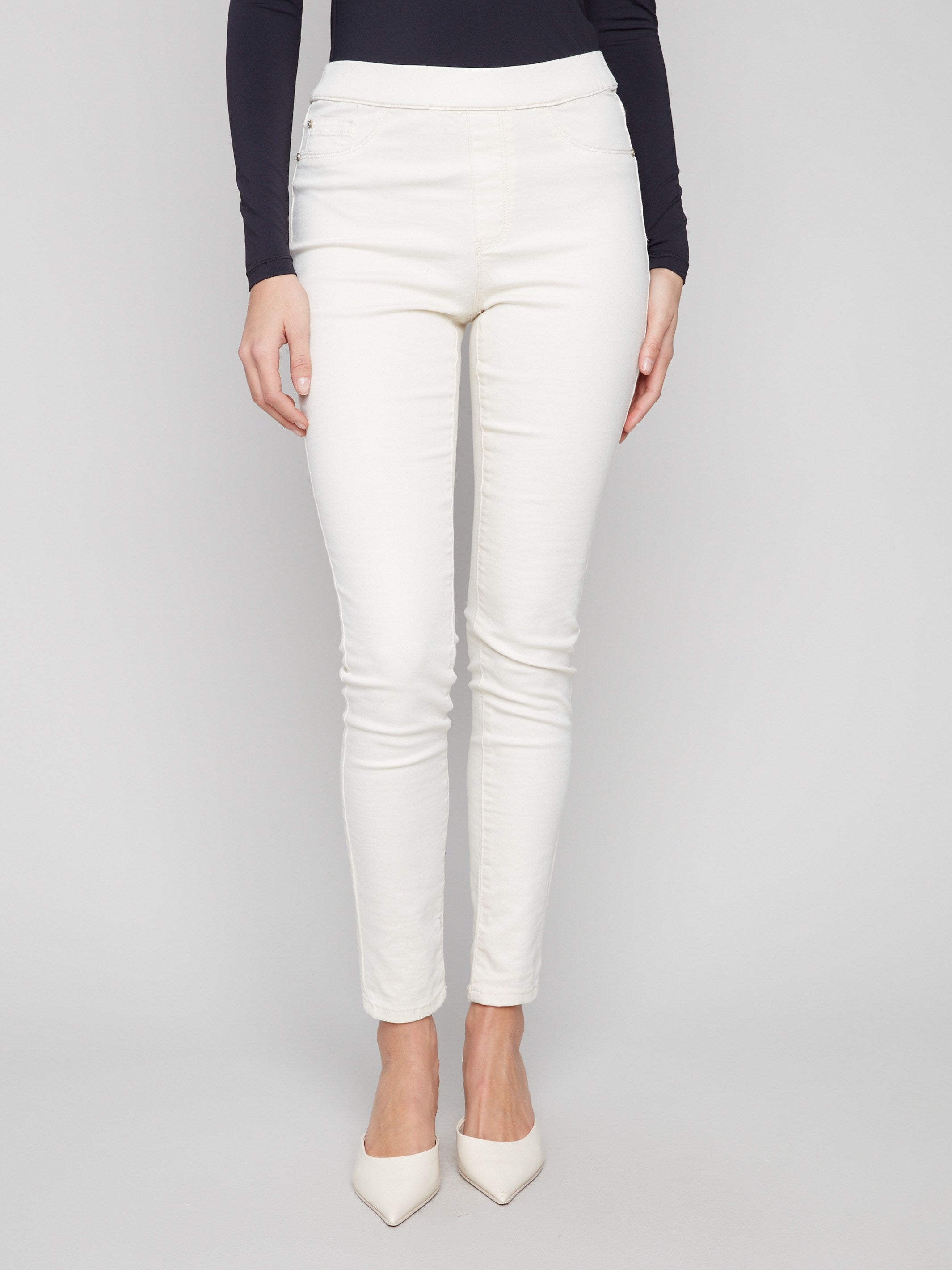 Long length twill pants offering a modern look with two front mock pockets, ideal for versatile styling by Charlie B.