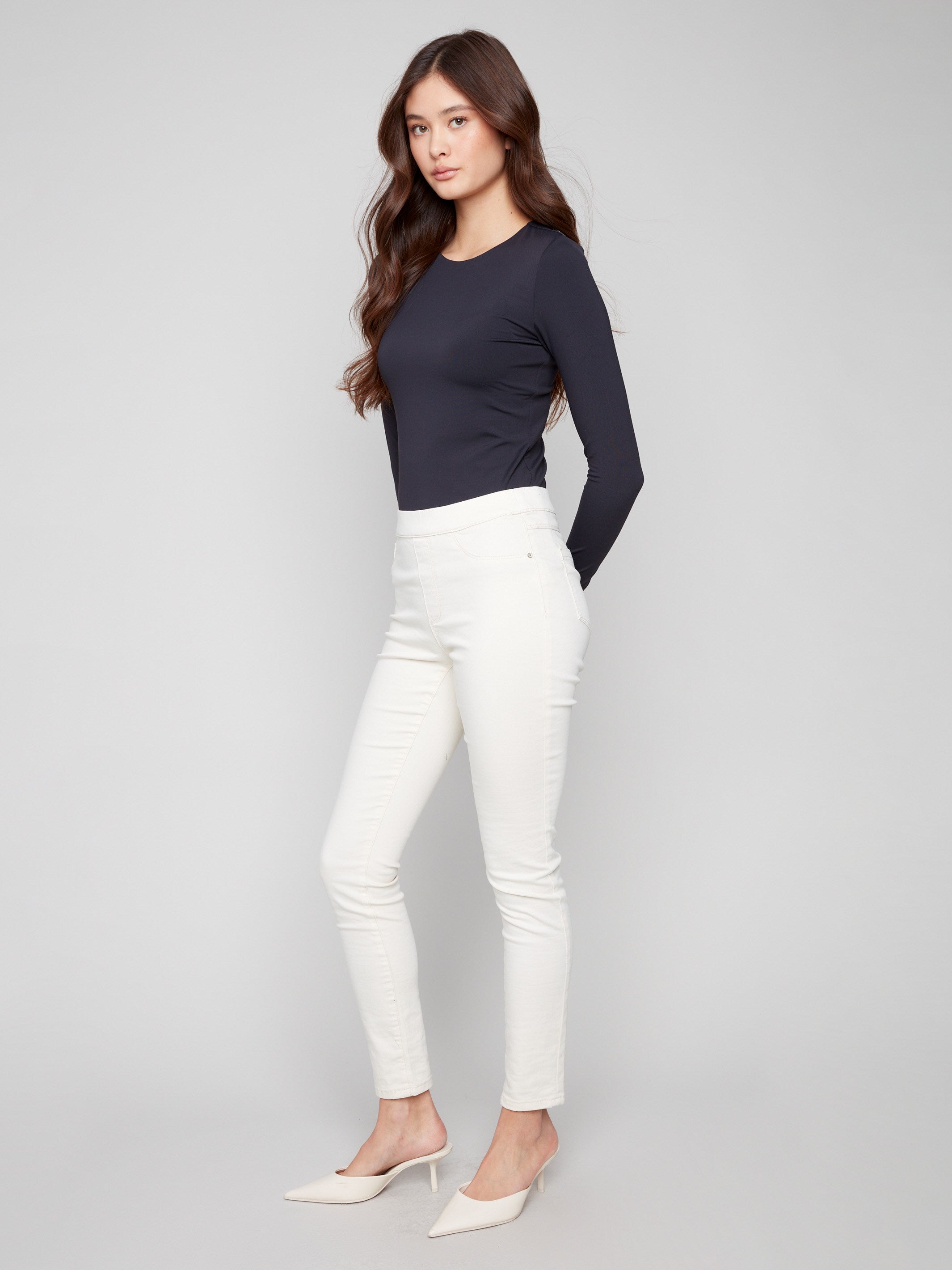 Effortless pull-on waistband enhances comfort and style in these slim-fit pants, perfect for everyday wear by Charlie B.
