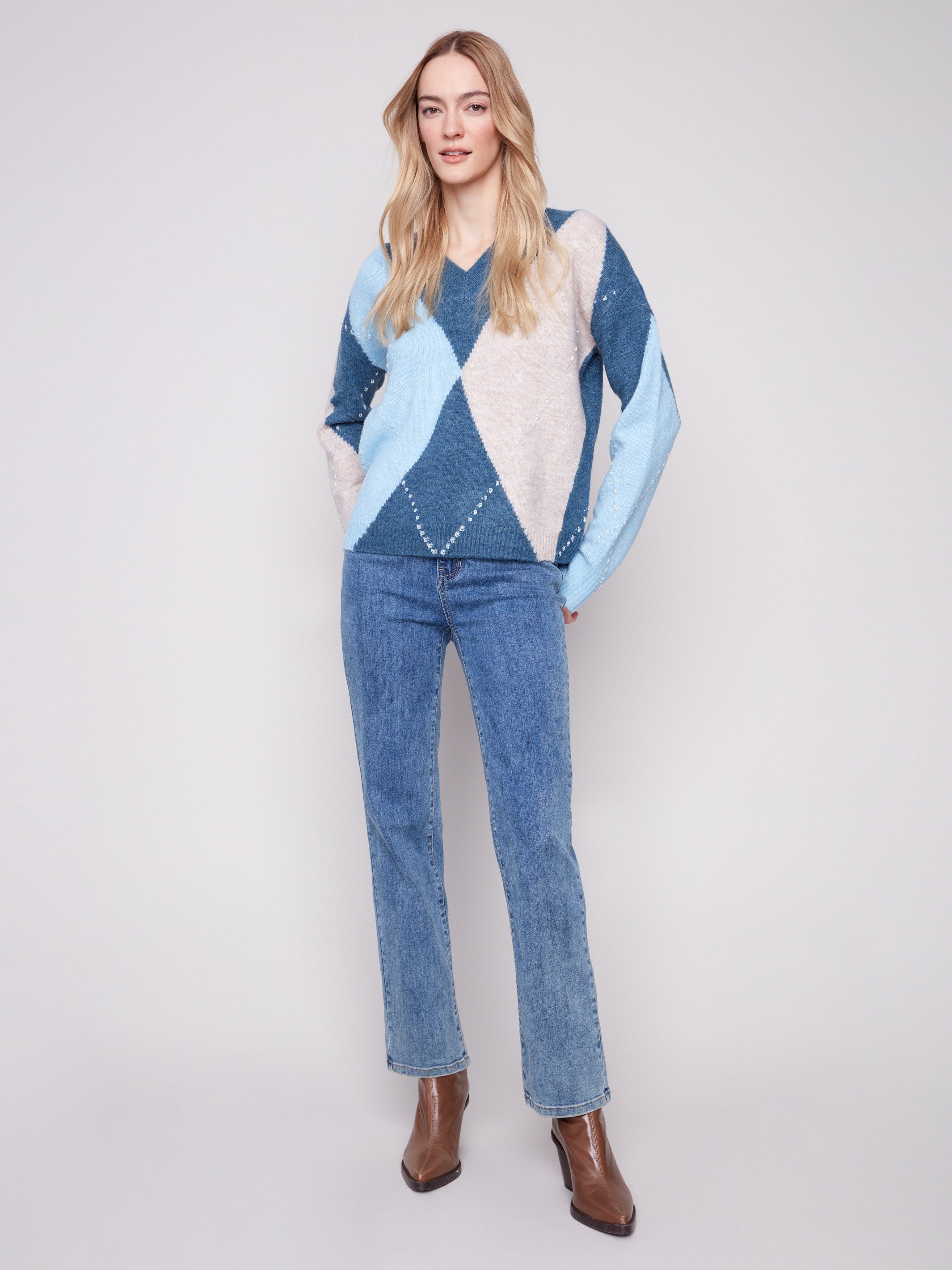 Argyle sweater featuring long sleeves for added warmth and style, crafted in Heather Denim by Charlie B.