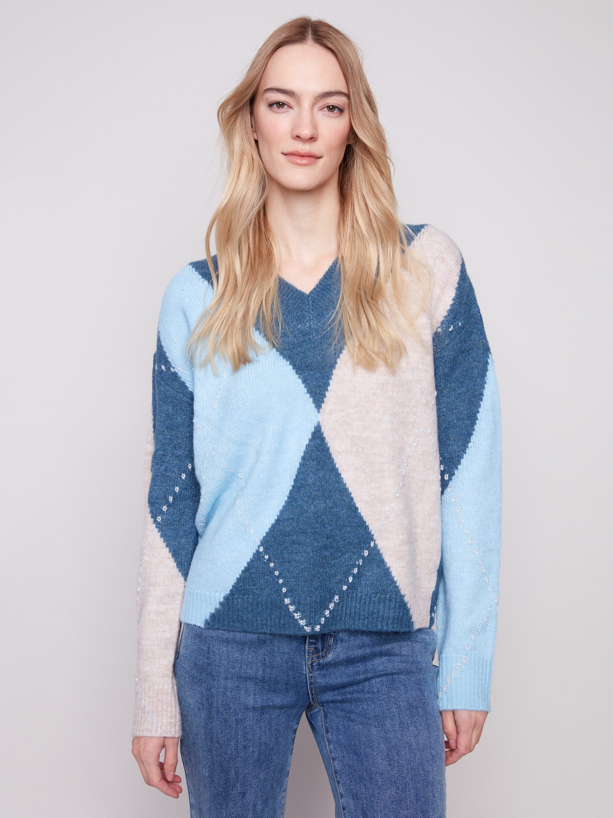 Stylish Heather Denim sweater showcasing long sleeves and an elegant design, ideal for cooler days by Charlie B.