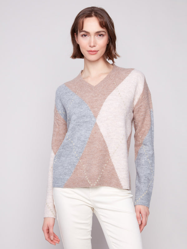 Heather Sesame sweater with jacquard style and argyle pattern, showcasing a cozy V-neck design by Charlie B.