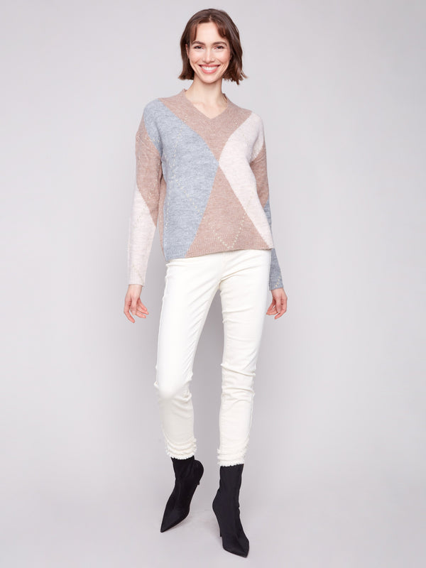 Chic long-sleeve sweater in Heather Sesame, featuring a stylish V-neck and intricate argyle pattern by Charlie B.