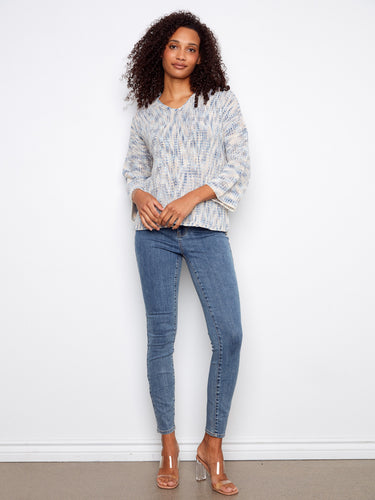 This mist-colored V-neck sweater showcases 3/4 sleeves, perfect for a casual yet chic look by Charlie B.