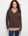 Brown sweater with a relaxed fit and striped poplin shirt collar, paired with jeans for a casual look by Charlie B.