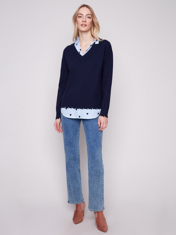 Chic navy V-neck sweater with side slits and heart details, paired beautifully with an embroidered poplin shirt collar by Charlie B.