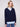 Chic navy V-neck design paired with an embroidered poplin shirt collar for an elegant touch by Charlie B.