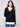 Black sweater featuring long sleeves and a chic layered design by Charlie B.
