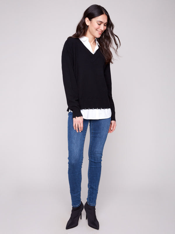 Elegant black sweater with side slits for added style by Charlie B.