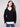 Sophisticated black sweater complete with poplin shirt collar detail by Charlie B.