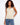 Gold sweater cami featuring a stylish V-neck and heart detail, perfect for layering by Charlie B.
