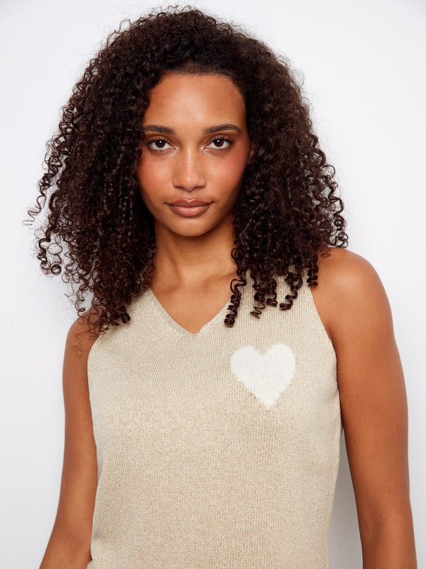 Chic sleeveless gold cami with a charming white heart accent, ideal for casual outings by Charlie B.