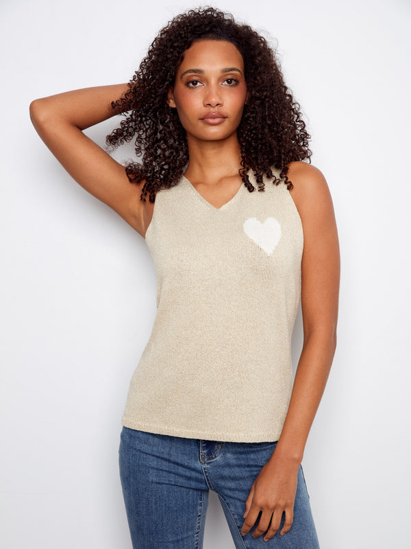Stylish gold cami showcasing a delicate white heart detail, crafted in a sleeveless style by Charlie B.
