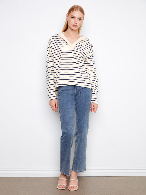 Effortless style with this navy and white high-low hem hoodie by Charlie B.