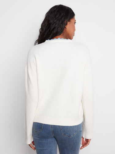 Crafted with attention to detail, this piece combines elegance and comfort effortlessly. By Charlie B.