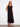 The tiered design of this dress adds a playful touch to its flowing silhouette by Charlie B.