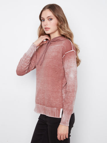 Designed with ribbed cuffs and hem, this hoodie offers a snug fit that complements your silhouette by Charlie B.