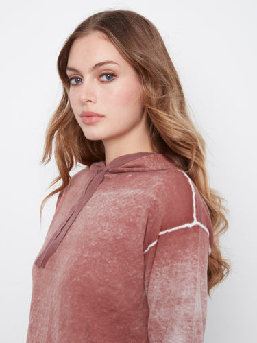 The hood comes with a drawstring for adjustable comfort and added style in this chic piece by Charlie B.
