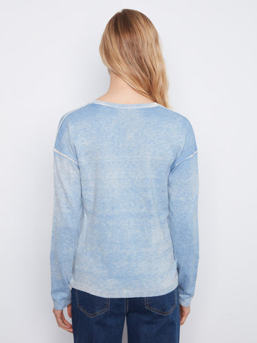 Elegant cotton-blend knit sweater with drop shoulders, perfect for layering in cooler weather. By Charlie B.