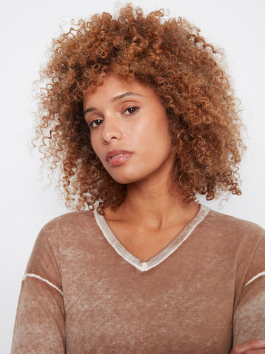 Crafted from a soft cotton-blend knit, this top is both comfortable and stylish. By Charlie B.