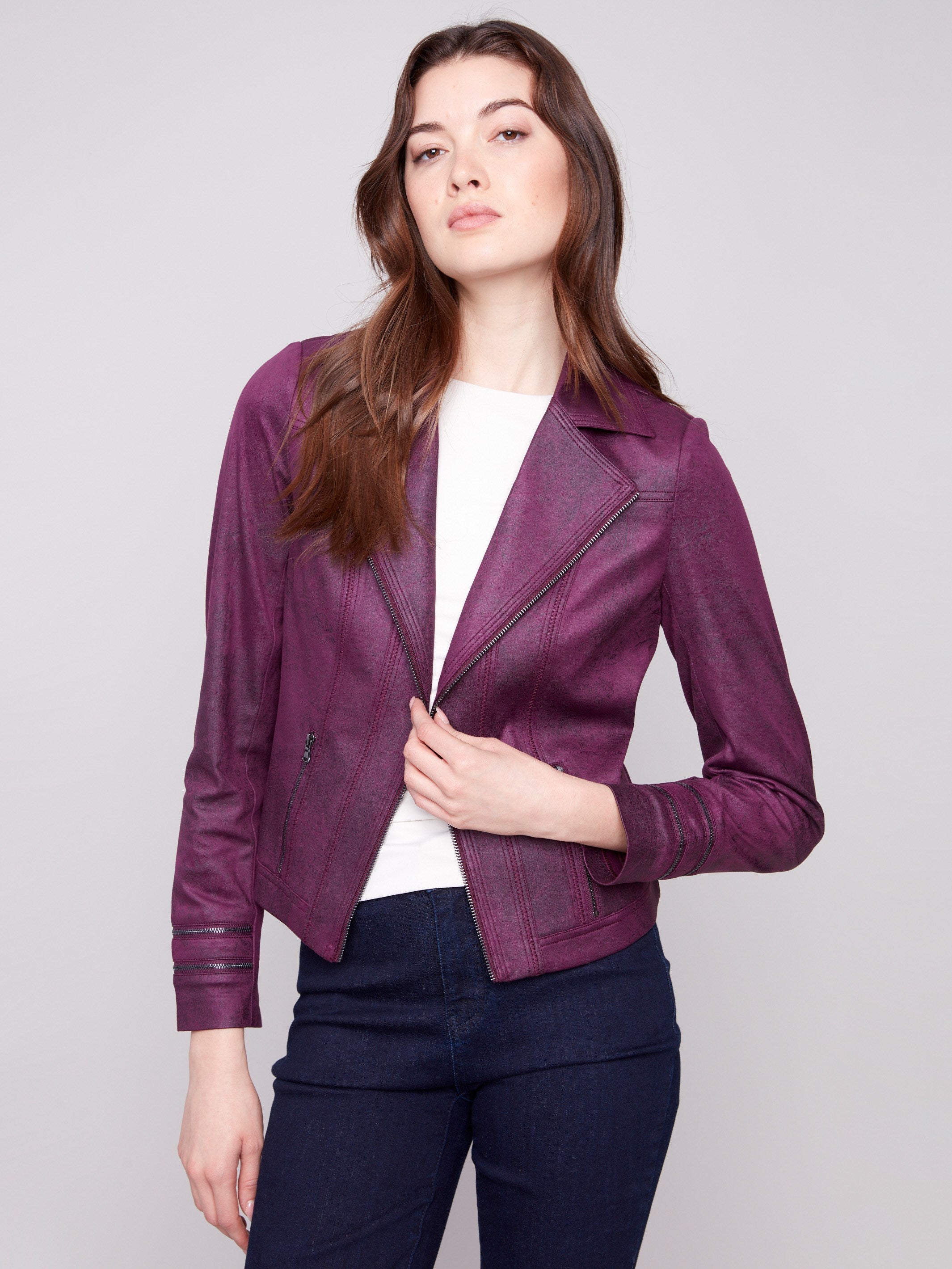 Faux leather jacket in berry with functional faux pockets by Charlie B.
