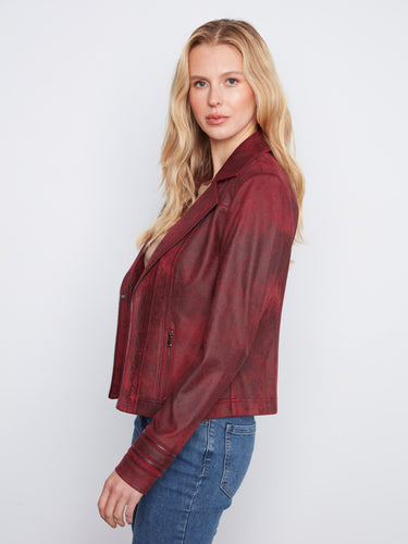 Faux zip pockets enhance the sleek design of this merlot vintage faux leather jacket by Charlie B.