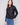 Black faux leather jacket featuring a stylish hook-and-eye closure for added elegance by Charlie B.