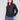 Black faux leather jacket featuring a stylish hook-and-eye closure for added elegance by Charlie B.